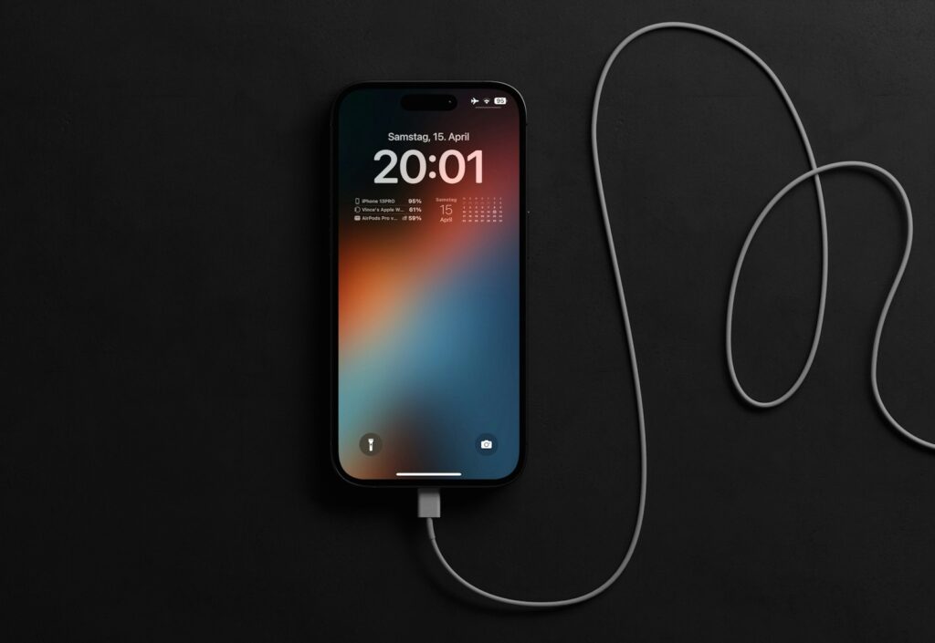 an iphone is plugged into a charger